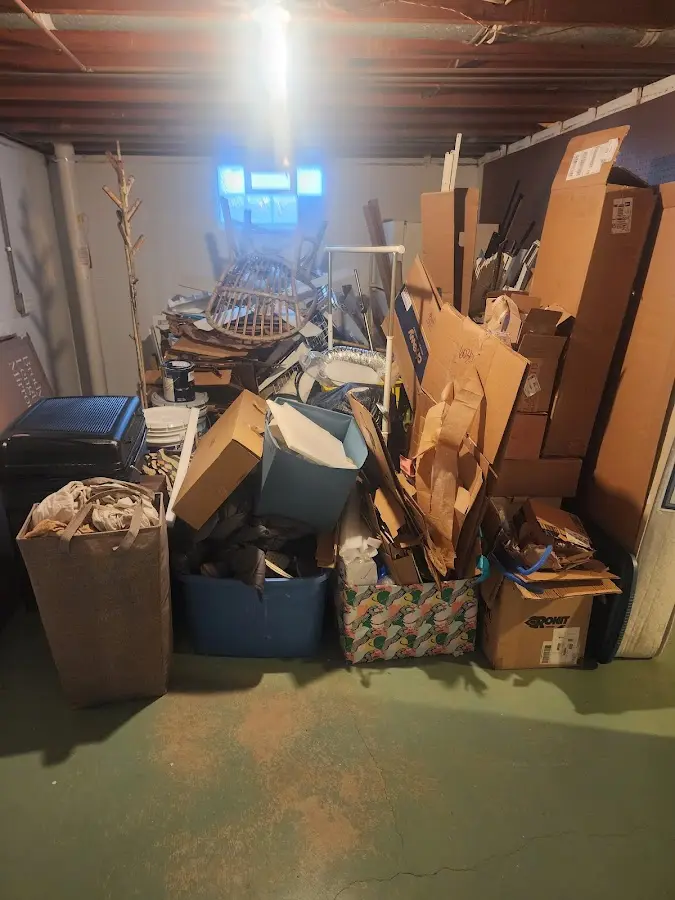 Roll-off dumpster container at job site for 4 Yard Dumpster Rental in Zimmerman